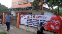 Pastikan Pemilu 2024 Aman, Personil Satreskrim Polresta Tangerang Gencar Pasang Spanduk Imbauan